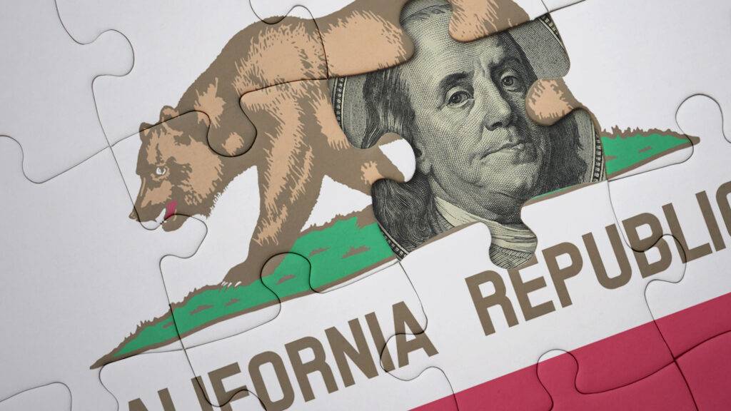 California flag puzzle piece missing revealing a hundred dollar bill underneath