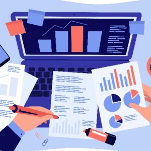 Business man looking at charts data on papers and laptop