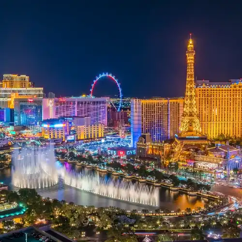 Fountain and city lights at night in Las Vegas, Nevada
