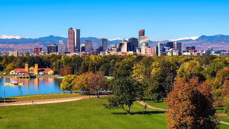 Denver City Skyline Lake and Mountains