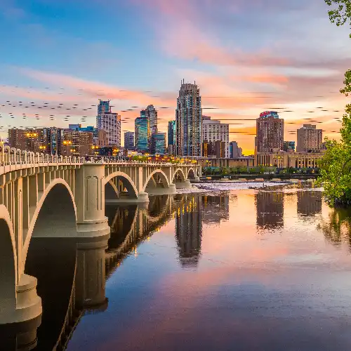 Minneapolis Bridge and Skyline at Sunset